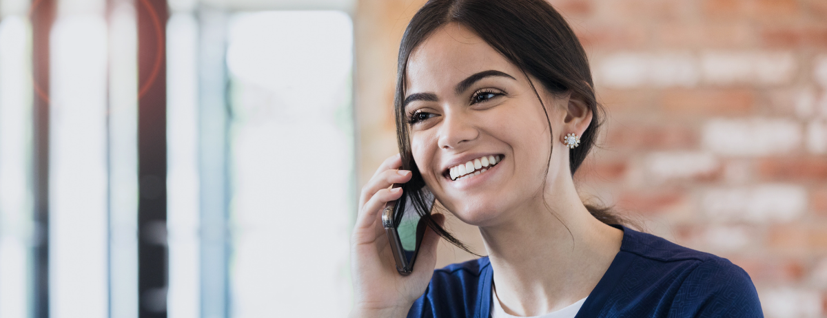 women talking on phone with medical card doctor